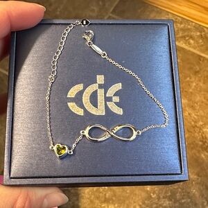 CDE Silver Infinity Bracelet with Heart Charm